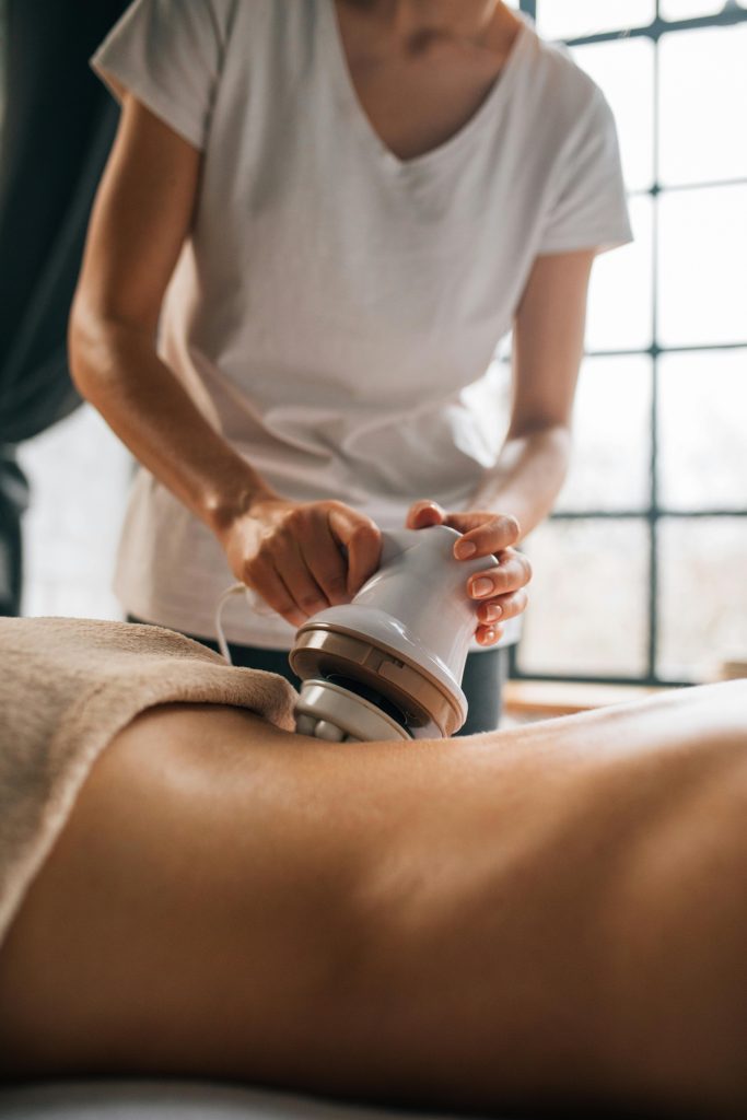 A soothing electronic massage session focusing on relaxation and self-care indoors.